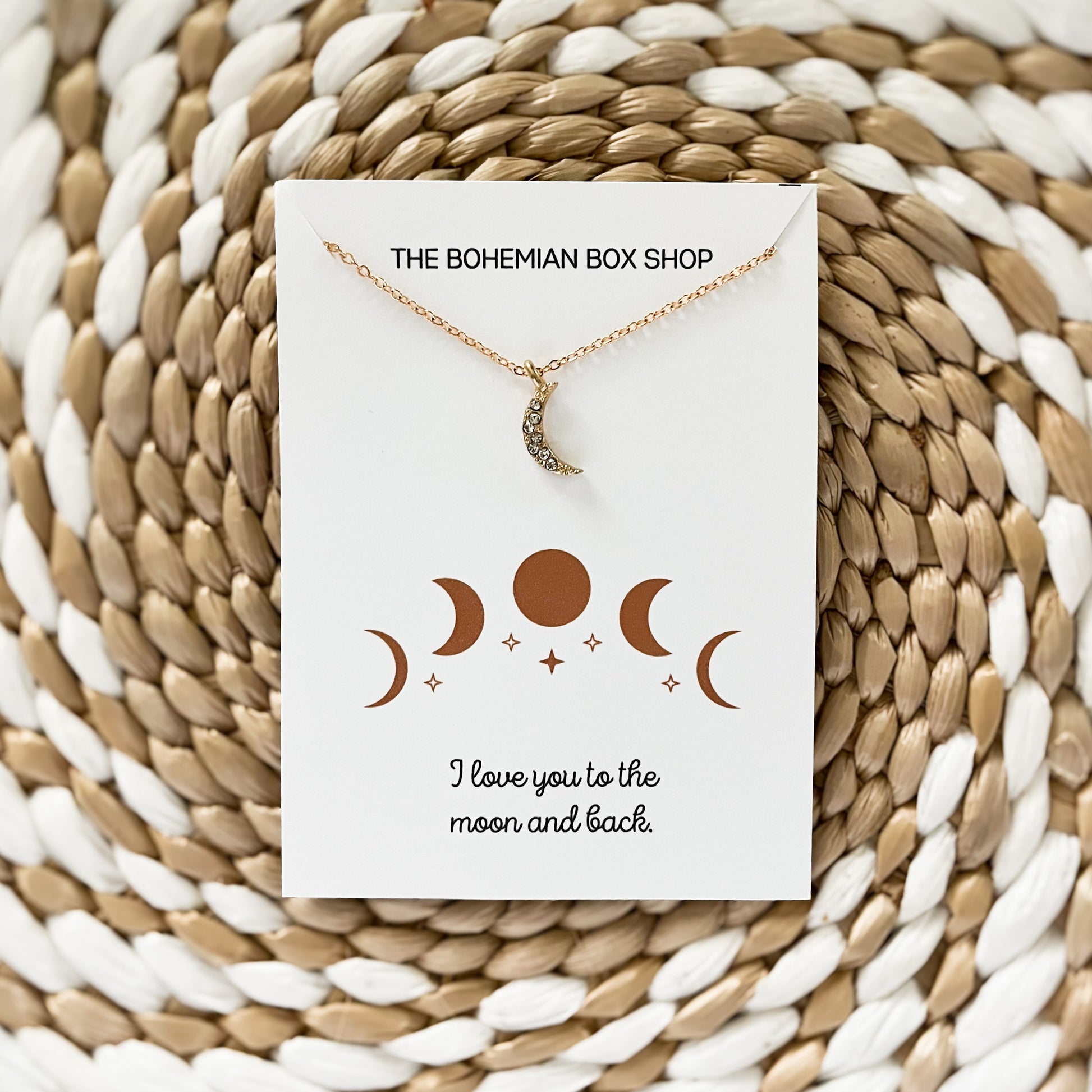 Boho moon necklace with the quote I love you to the moon and back 